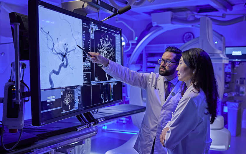 Physicians looking at screen