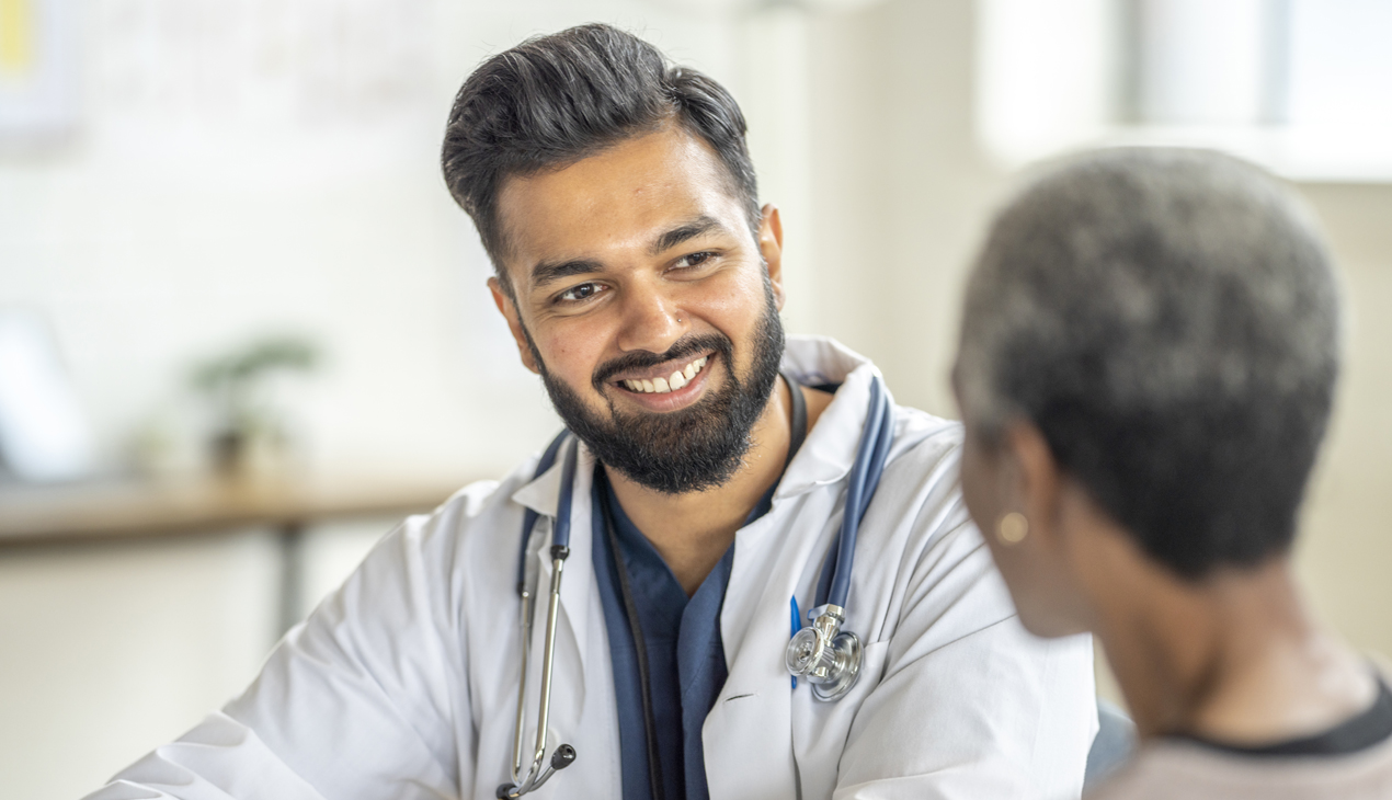 Provider smiling at patient