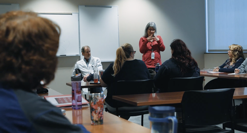 PHI representative giving presentation