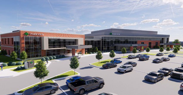 Parkview hospital building with parking lot