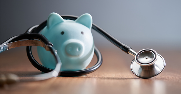 piggy bank with a doctor stethoscope