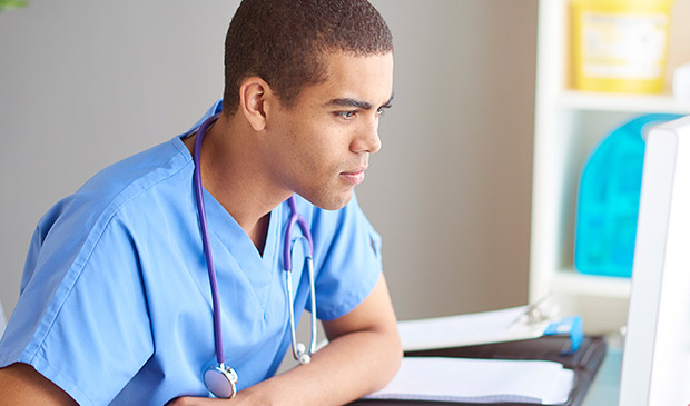 Nurse working at computer