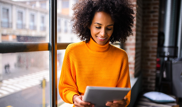 Woman looking at tablet