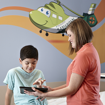 Childrens Emergency Professional with Patient
