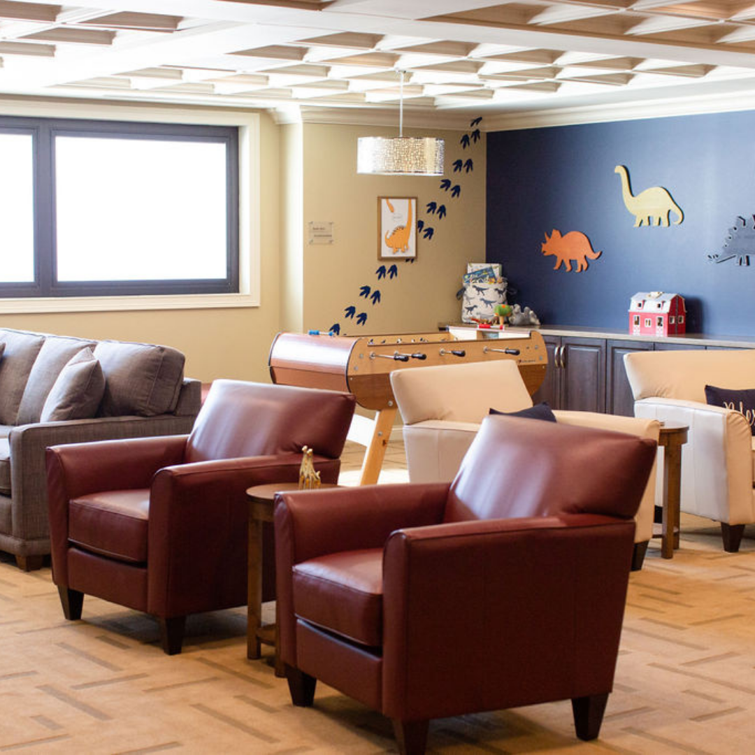 Living room with chairs and games